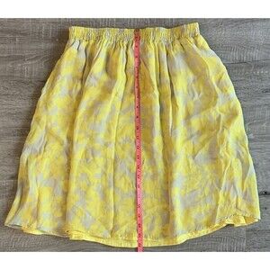 Rippa Womens Yellow Tan Floral Patterned Pleated Silk Skirt Size 8 Pockets